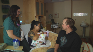 Dad Breastfeeds Newborn at DCMC