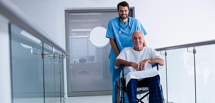 Nurse with Patient in Wheelchair