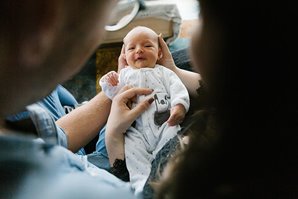 Parents Holding Infant