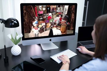 Person on computer looking at online auction