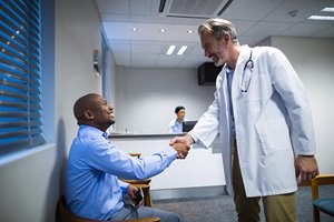 Doctor greeting patient