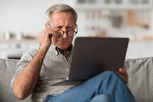 Man having trouble with eyesight