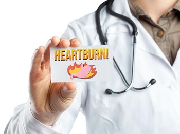 Doctor diagnosing heartburn