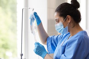 Nurse preparing equipment