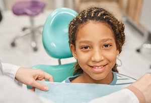 Young girl at dentist office