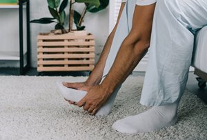Person with foot pain