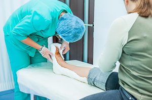 Doctor Treating Wound