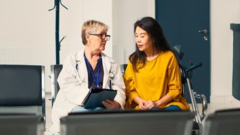 Doctor talking to patient from another country